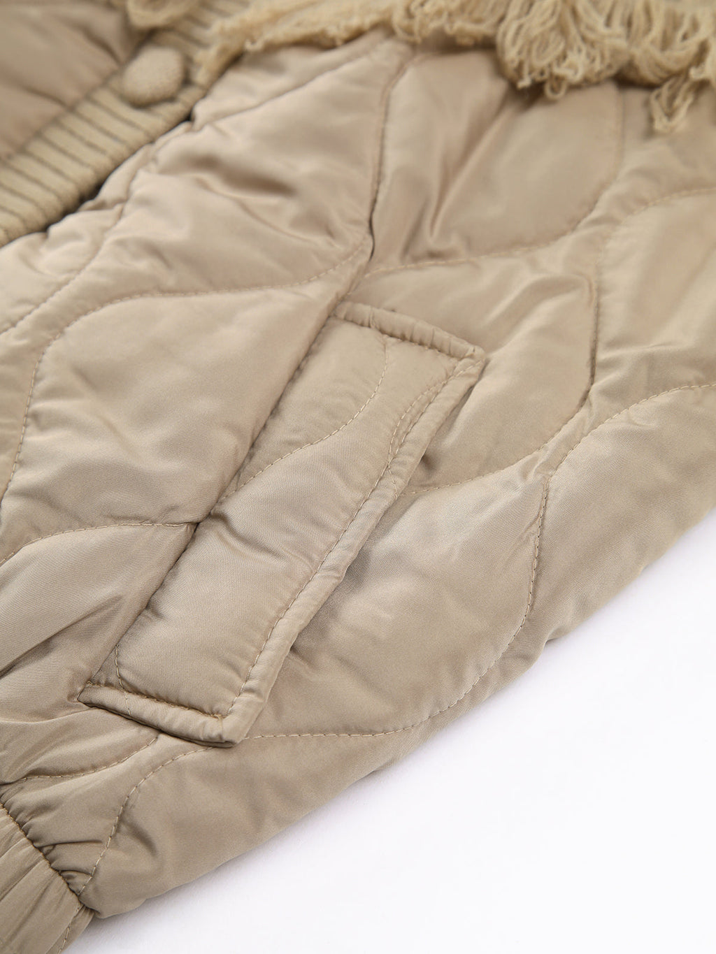 Siyaje | Veste matelassée en tricot torsadé patchwork